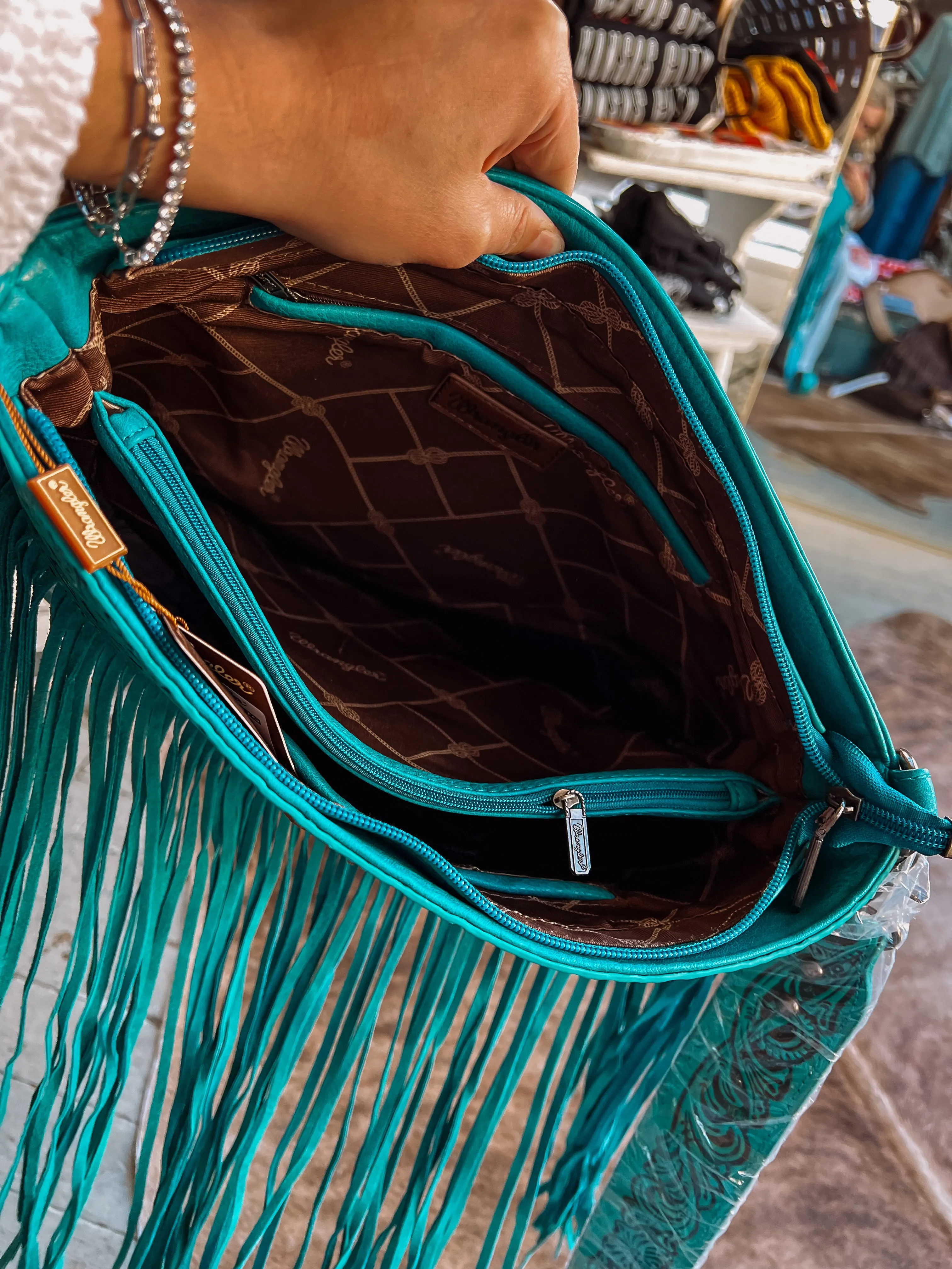 The Layton Fringe Wrangler Crossbody Bag